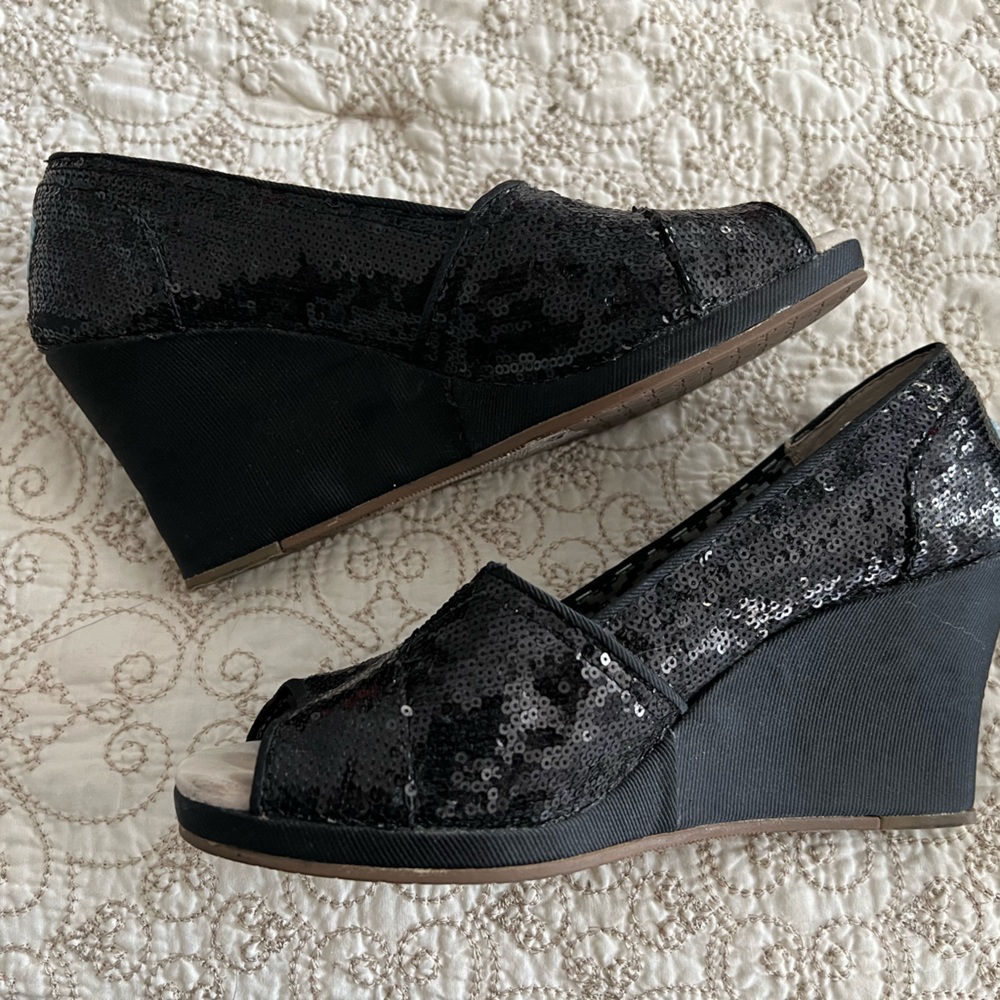 Tom’s black sequins wedges